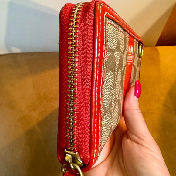 Coach zippered wallet in orange. - Picture 8 of 10
